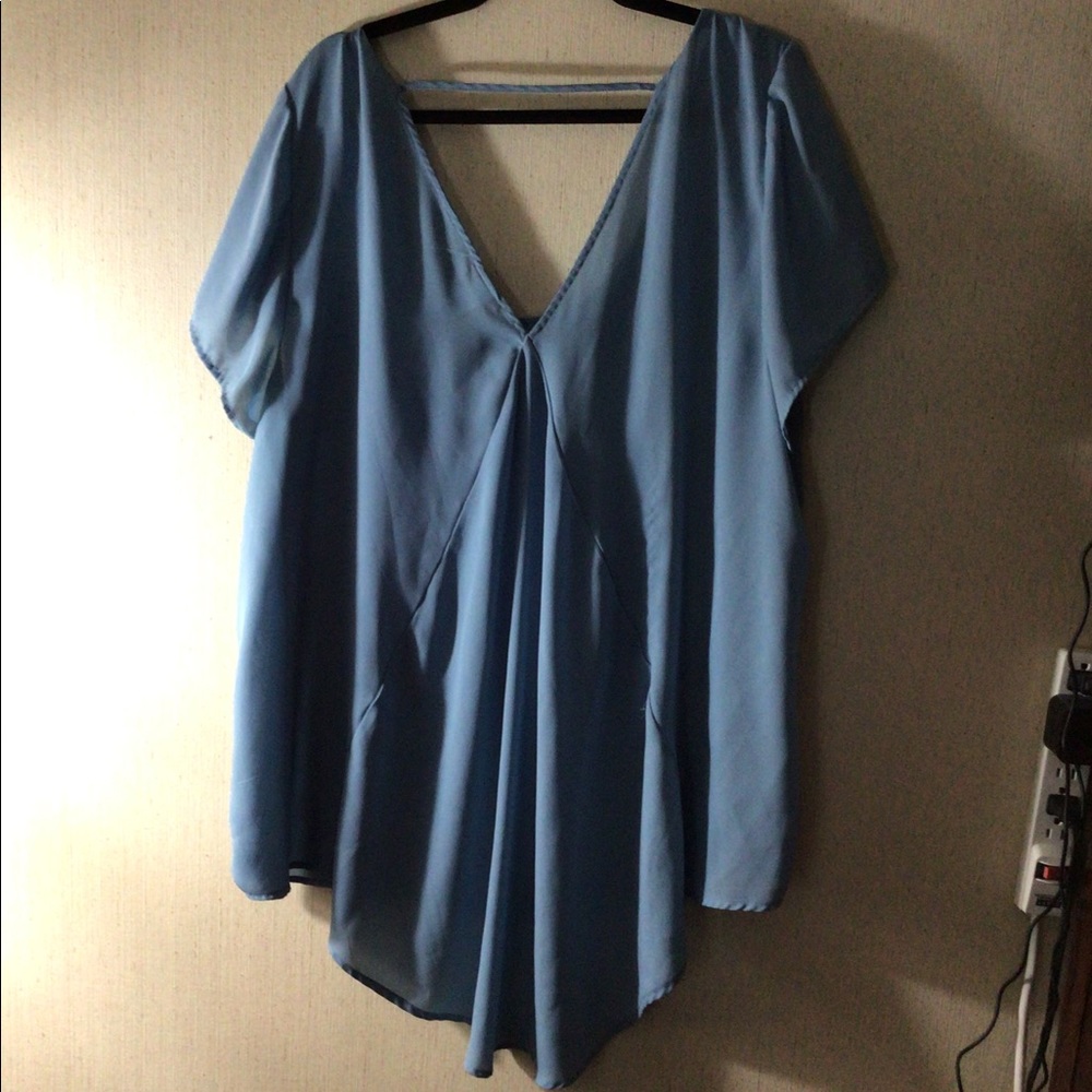 Torrid Size 3 baby blue high-low top.